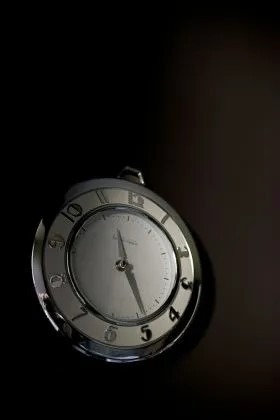 Bathroom wall clock with silver accenst