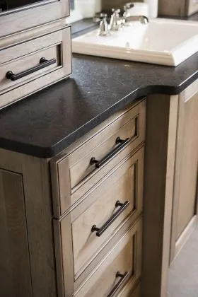 Inspirations Studio wood cabinent with black stong countertop