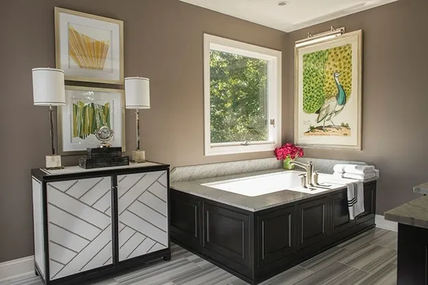 Bathroom renovation after image showing vanity and large jacuzzi bathtub