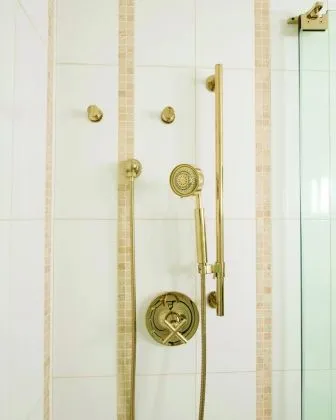 Kohler Purist in French gold shower head and hardward